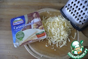 Фаршированный перец в сырно-овощном соусе