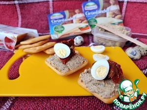 Шпротная закуска на крекерах