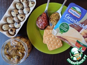 Шпротная закуска на крекерах