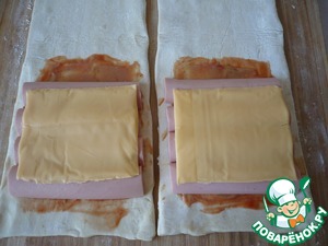 Конвертики из слоеного теста с сосисками Конвертики из слоеного теста с сосисками