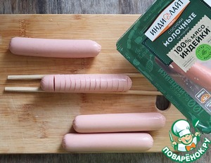 Сосиски "Солнышки", запеченные с картофельным пюре Сосиски "Солнышки", запеченные с картофельным пюре