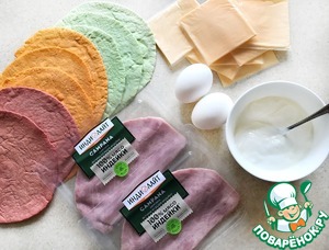 Завитки из тортильи с ветчиной и сыром Завитки из тортильи с ветчиной и сыром