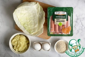 Капустные трубочки с сосисками и картофелем Капустные трубочки с сосисками и картофелем