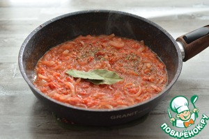 Свиные ребра, тушеные с помидорами