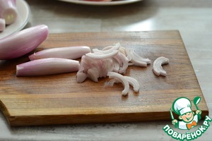 Свиные ребра, тушеные с помидорами