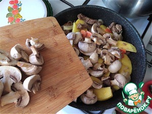 Тушёная говядина с грибами, горошком, картофелем