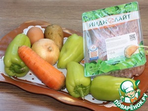 Половинки перца, запечённые с начинкой