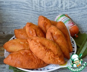 Жареные пирожки с капустой и колбасой
