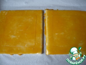 Закусочные слойки с плавленым сыром Закусочные слойки с плавленым сыром