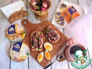 Бутерброд с плавленным сыром и шпротами