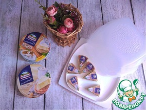 Бутерброд с плавленным сыром и шпротами