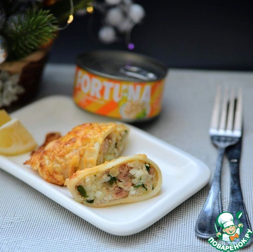 Кальмары, фаршированные тунцом и рисом
