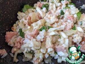 Кальмары, фаршированные тунцом и рисом