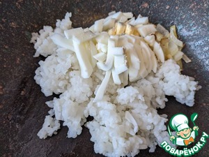 Кальмары, фаршированные тунцом и рисом